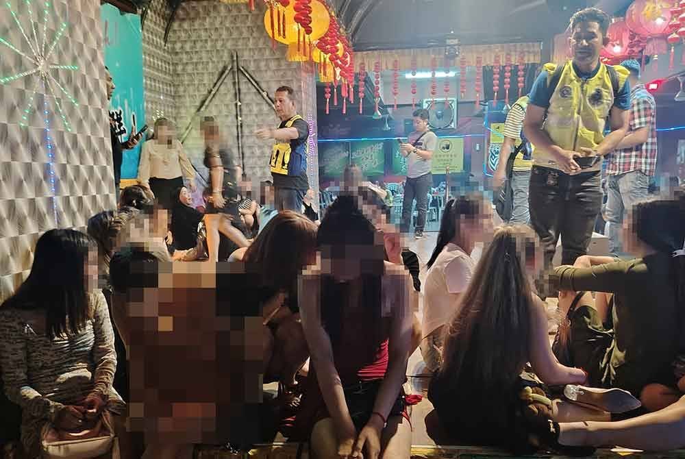 Wanita asing disyaki GRO yang ditahan dalam serbuan sebuah pusat hiburan di Jalan Pasar Baharu Pudu, pada Jumaat.