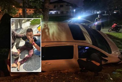 Keadaan MPV yang terjatuh ke dalam lubang di Taman Bentong Makmur pada Isnin. Gambar kecil: Suspek berusia 40 yang berjaya ditahan. Foto ihsan PDRM
