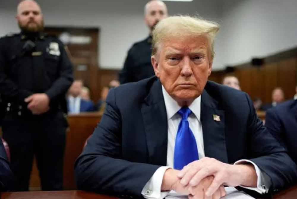 Trump ketika hadir prosiding di Mahkamah Jenayah Manhattan di New York pada 30 Mei lalu. Foto Agensi