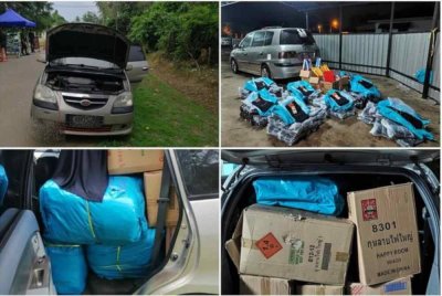 Hasil pemeriksaan terdapat beberapa bungkusan mengandungi 129 helai seluar jeans ditemukan dalam kenderaan terbabit tanpa dokumen yang sah. Foto PGA7