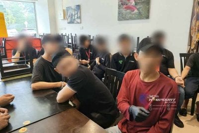 Sebahagian warga asing yang ditahan dalam serbuan berkenaan. - Foto JIM Johor