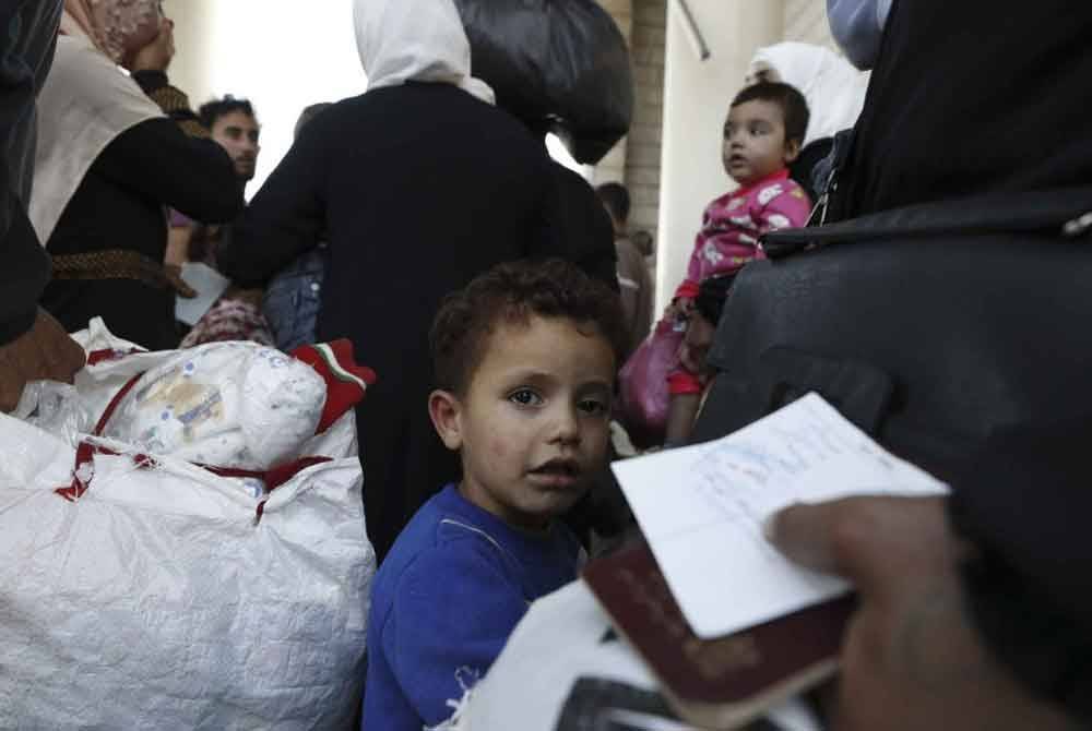 Salah seorang kanak-kanak yang berada di sempadan Syria-Lubnan selepas melarikan diri bersama keluarganya menuju ke Damsyik.