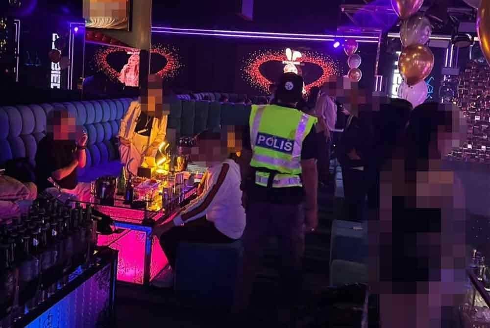 Polis tahan seorang wanita tempatan berperanan sebagai penjaga premis serta sembilan lelaki warga asing yang bekerja sebagai pelayan.