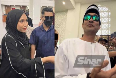 Diana (kiri) dan Farid ketika tiba di Mahkamah Rendah Syariah Wilayah Persekutuan, Kuala Lumpur pada Rabu.