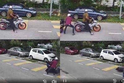 Video rakaman yang memaparkan kes samun penunggang motosikal di Jalan Kangar 87, Batu 2 1/4, di sini, pada Ahad.
