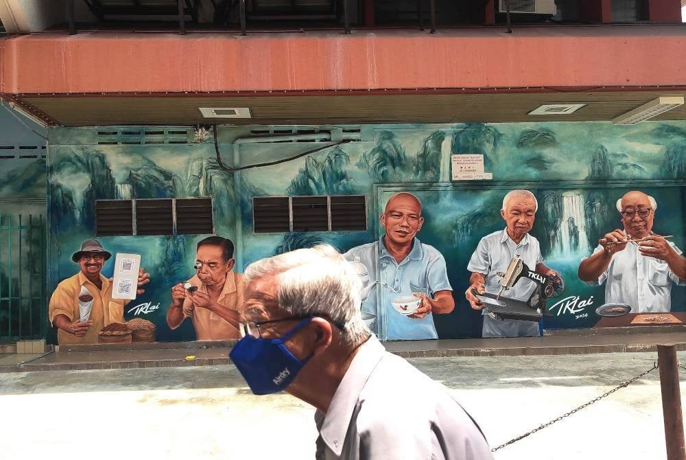 Imej beberapa peniaga diabadikan pada dinding.