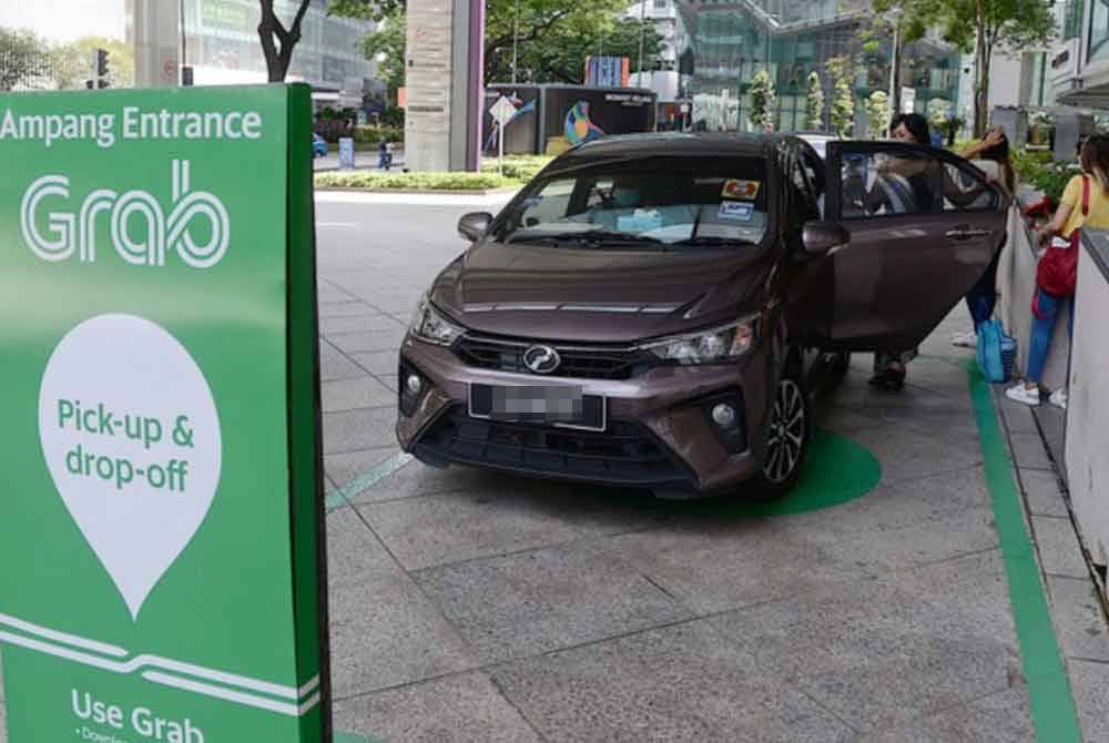 Mimi mendedahkan dia mampu meraih pendapatan kasar hingga RM7,000 sebagai pemandu Grab. Gambar hiasan