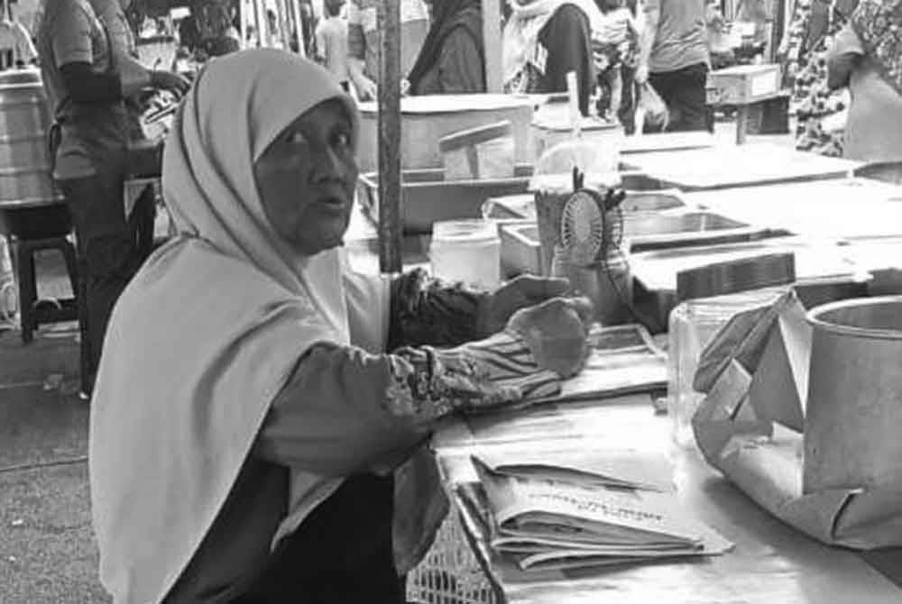 Norlia yang sudah lama meniaga nasi lemak meninggal dunia akibat kemalangan pada pagi Jumaat. FOTO/ Ihsan Abdul Azim.