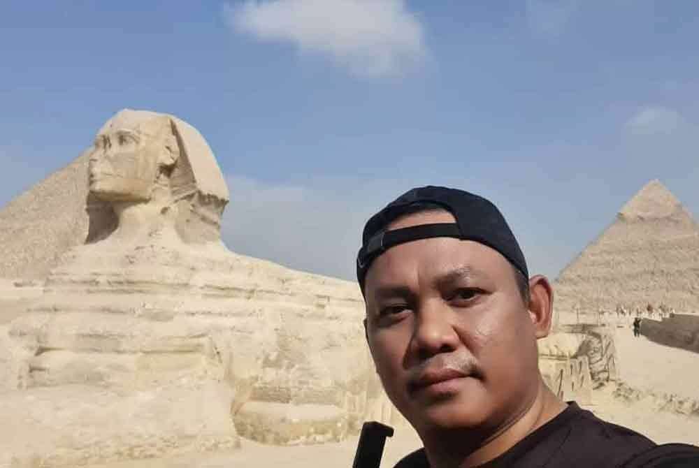 Hanizamal ketika melakukan aktiviti memburu paranormal di Mesir. Foto ihsan: Solo Ambush