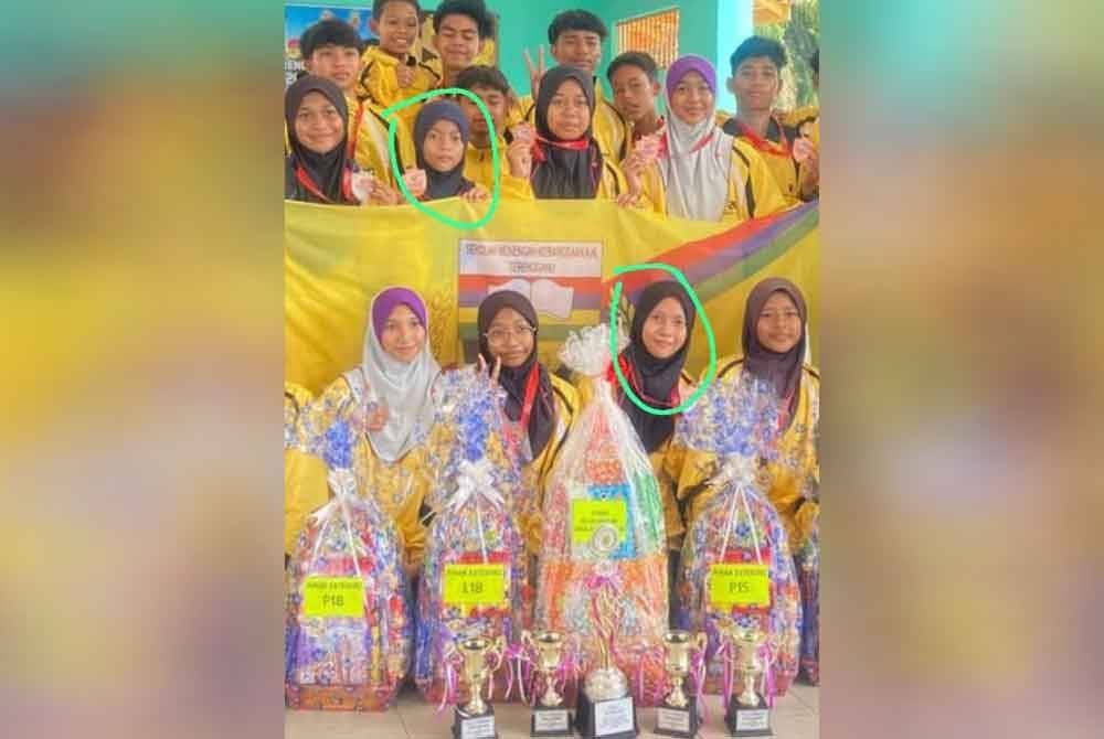 Siti Fatimah dan kakaknya, Puteri Sajidah (dalam bulatan) aktif menyertai aktiviti sukan dan rajin membantu guru serta rakan di sekolah.