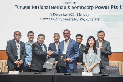 Majlis menandatangani Perjanjian Bekalan TBB antara TNB dan Sembcorp Power yang disaksikan wakil kerajaan kedua-dua negara. Foto Petra