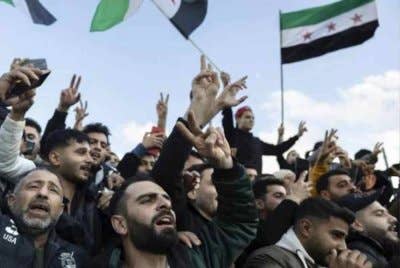 Warga Syria yang berada di pelbagai negara di dunia turut meraikan pengakhiran cengkaman Bashar Al-Assad. - AP