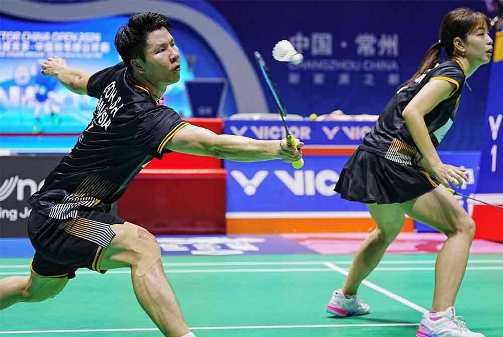 Soon Huat (kiri) dan Shevon terpaksa akur tewas kepada rakan senegara dalam aksi pertama WTF di Hangzhou pada Rabu. Foto Agensi.