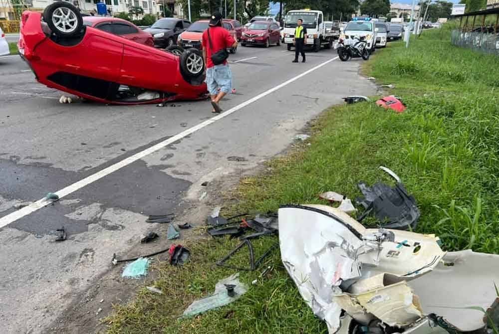 Keadaan Perodua Myvi selepas terlibat kemalangan di Jalan Lintas, Kota Kinabalu pada Selasa.