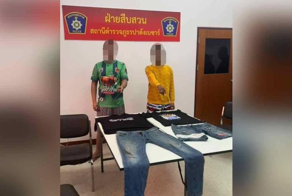 Dua lelaki warga Thailand ditahan Polis Thailand di negara itu, Jumaat lalu.