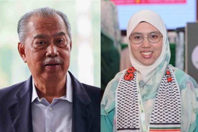 Tan Sri Muhyiddin Yassin (kiri), Dr Siti Mastura Muhammad. 