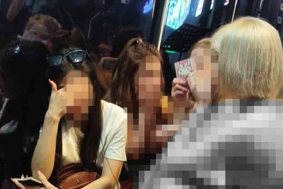 Sebahagian gadis GRO warga asing ditahan JIM menerusi Ops Gegar yang dijalankan di sebuah premis hiburan di Kuala Lumpur pada Selasa. Foto: JIM.