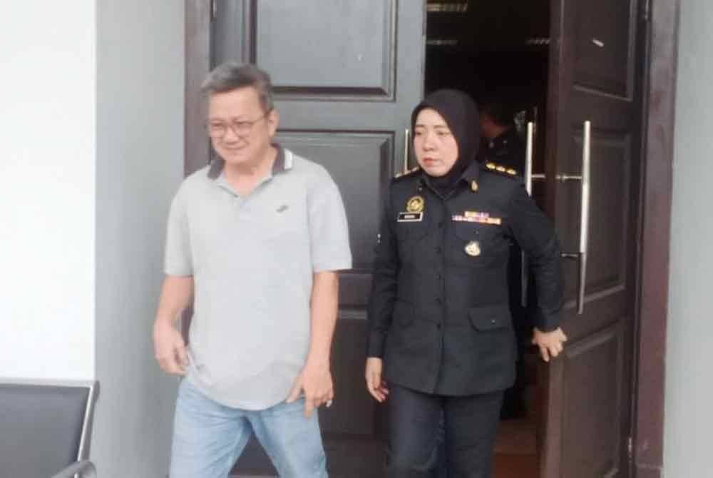 Salah seorang tertuduh yang didakwa di Mahkamah Sesyen di Seremban pada Khamis.