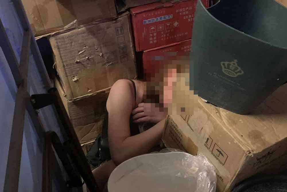 Antara cubaan menyorok wanita asing ketika serbuan premis oleh JIM.