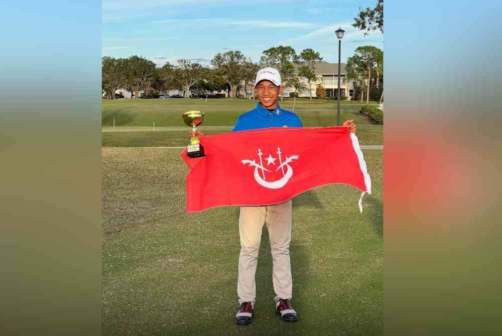 Muhammad Afham mengibarkan bendera Kelantan di AS sebaik memenangi kejohanan.