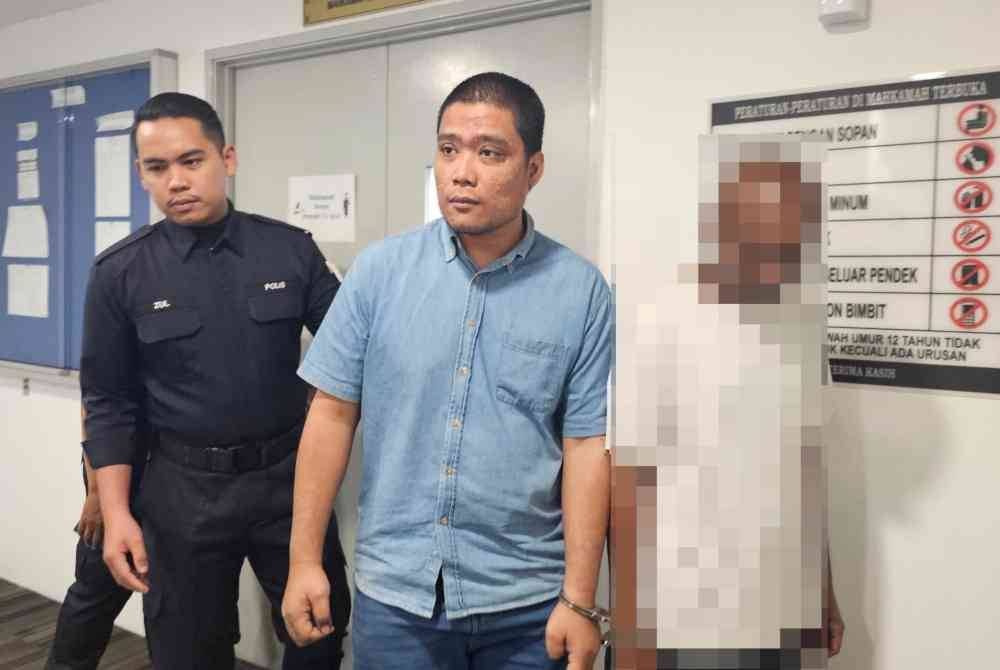 Muhammad Firdaus dibawa keluar dari Mahkamah Sesyen Ipoh pada Jumaat selepas selesai prosiding pertuduhan menyebabkan kematian seorang penghuni pusat jagaan psikiatri di Ipoh.