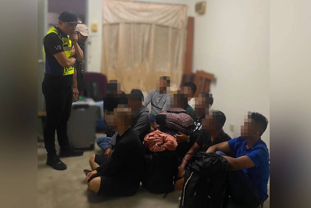 Antara PATI yang ditahan polis dalam serbuan di sebuah unit flat di Bandar Mahkota Cheras, Selangor pada Selasa.