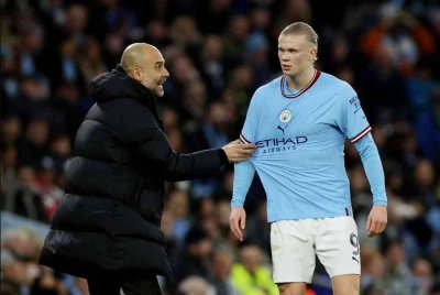 Haaland (kanan) akui selesa bekerja bersama Guardiola. Foto Agensi