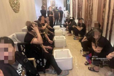 Sebahagian yang ditahan dalam serbuan JIM, pada Khamis. Foto JIM Johor