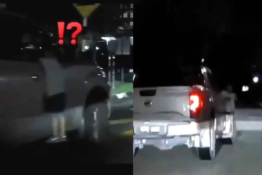 Tangkap layar video tular menunjukkan seorang kanak-kanak bergayut pada pacuan empat roda sedang bergerak di Bandar Baru Nilai.