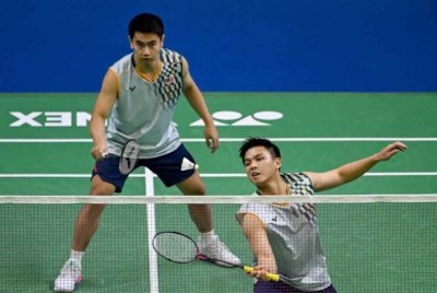 Nur Izzuddin (kanan) Sze Fei muncul juara Terbuka India setelah menewaskan pasangan Korea Selatan dalam aksi final di New Delhi pada Ahad. Foto AFP.