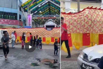 Tangkap layar video tular memaparkan replika naga mempunyai bendera negara China di Muar.