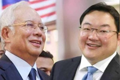 Najib Tun Razak (kiri), Jho Low (kanan).