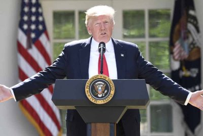 Kebangkitan Trump dan slogannya ‘Agungkan AS sekali lagi’ (Make America Great Again - MAGA) berlatarkan dua perkembangan. Foto AFP