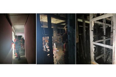 Pasukan bomba ketika melakukan operasi memadam kebakaran di sebuah bangunan rumah kedai di Jalan Pantai Berahi, Petagas, Putatan.