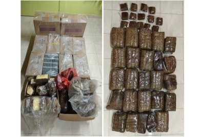 Pasukan Polis Marin Wilayah Tiga Pengkalan Kubor merampas 60,000 batang rokok putih dan 33 kilogram tembakau dalam serbuan di sebuah premis di Kampung Kutan, Tumpat pada Rabu. Foto PPM