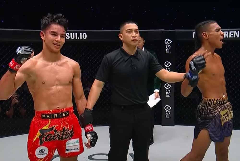 Jojo (kiri) berjanji akan bangkit dalam pertarungan seterusnya.