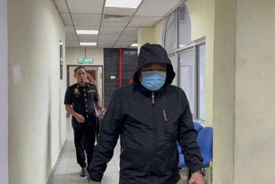 Tertuduh ketika hadir di Mahkamah Butterworth, pada Isnin.