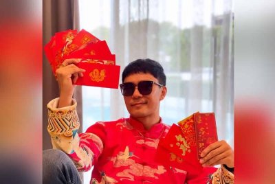 Andy teruja kerana masih menerima angpau setiap kali Tahun Baharu Cina.