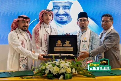 ABDUL MALIK (dua dari kanan) memperbaharui kontrak strategik bernilai RM20 juta bersama Hotel Safwah di Arab Saudi baru-baru ini.