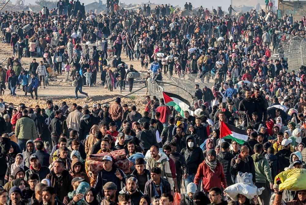 PBB melaporkan bahawa hampir setengah juta orang telah kembali ke kawasan utara Semenanjung Gaza sejak gencatan senjata berkuat kuasa. Foto AFP