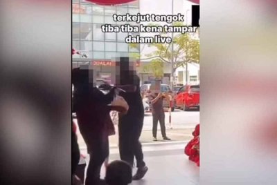 Video tular memaparkan tindakan seorang lelaki menampar isterinya di sebuah pusat beli-belah.