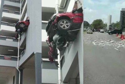 Sebuah Honda WR-V hampir terjatuh dari tingkat tiga selepas merempuh dinding parkir di Pusat Jantung Sultan Idris Shah, Serdang, pada Selasa.