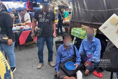 Dua daripada 18 pengemis warga asing yang ditahan dalam operasi pada Isnin. - Foto JIM Johor