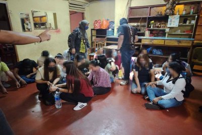 Antara yang ditahan dalam serbuan premis di Jalan Pudu, pada Rabu.