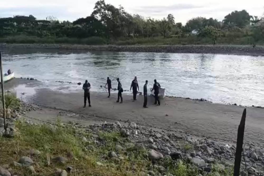 Pencarian dilakukan di tebing Sungai Kadamaian, lokasi mangsa dikhuatiri lemas di Kampung Pirasan, Kota Belud.