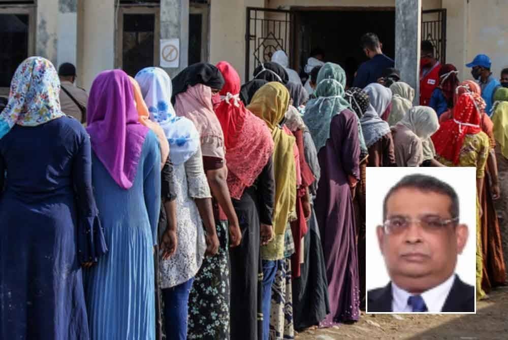 Tiada undang-undang membenarkan pelarian daripada mana-mana negara termasuk Rohingya dibenarkan bekerja di Malaysia. (Foto hiasan) Gambar kecil: Norman Fernandez