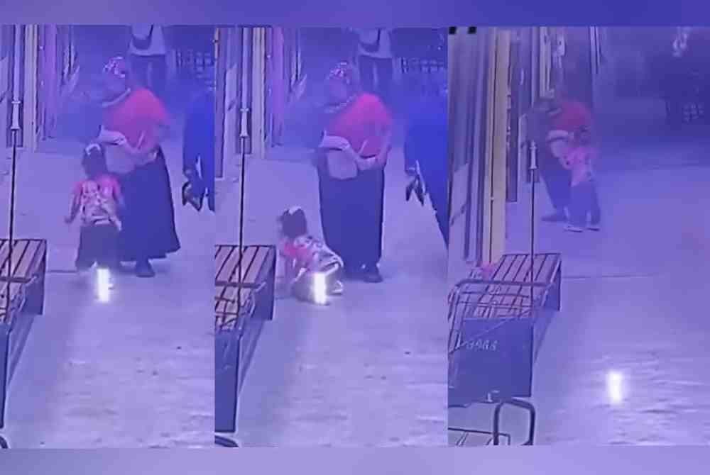 Tangkap layar video seorang wanita didakwa memukul anaknya sehingga cedera yang tular di media sosial.