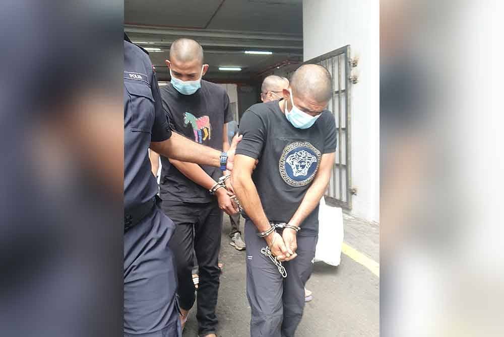 Kedua-dua tertuduh ketika dibawa ke Mahkamah Butterworth pada Rabu.