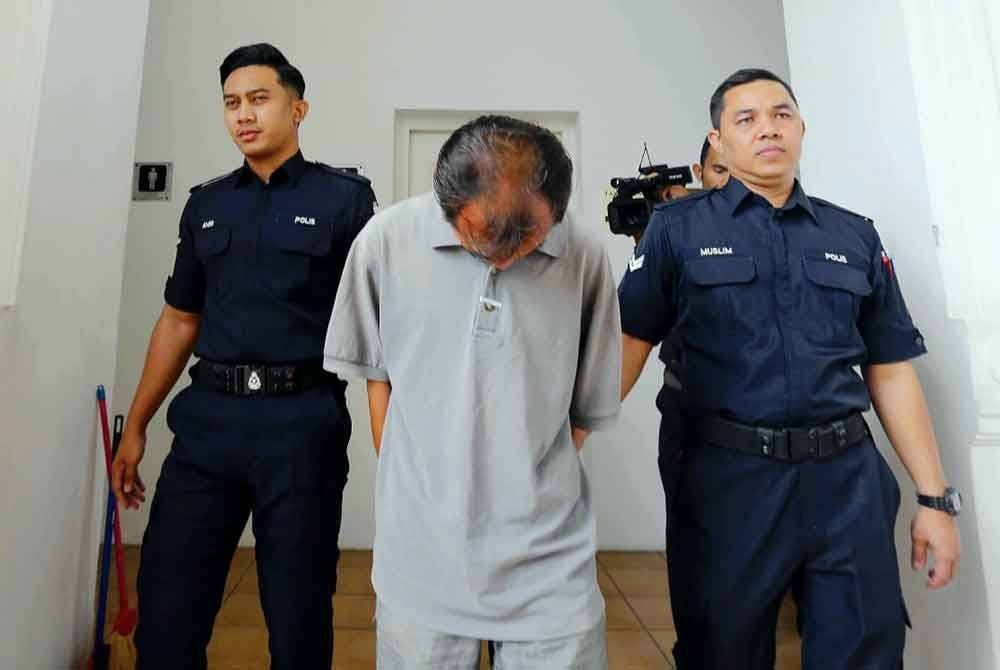 Tertuduh dibawa keluar dari Mahkamah Sesyen Ipoh pada Rabu.