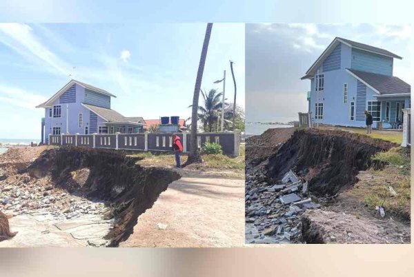Pagar sebelah kanan rumah Nohd Yazit berisiko runtuh ketika ditemui pemberita di Kampung Tanjung, Batu Rakit, Kuala Nerus pada pagi Selasa.